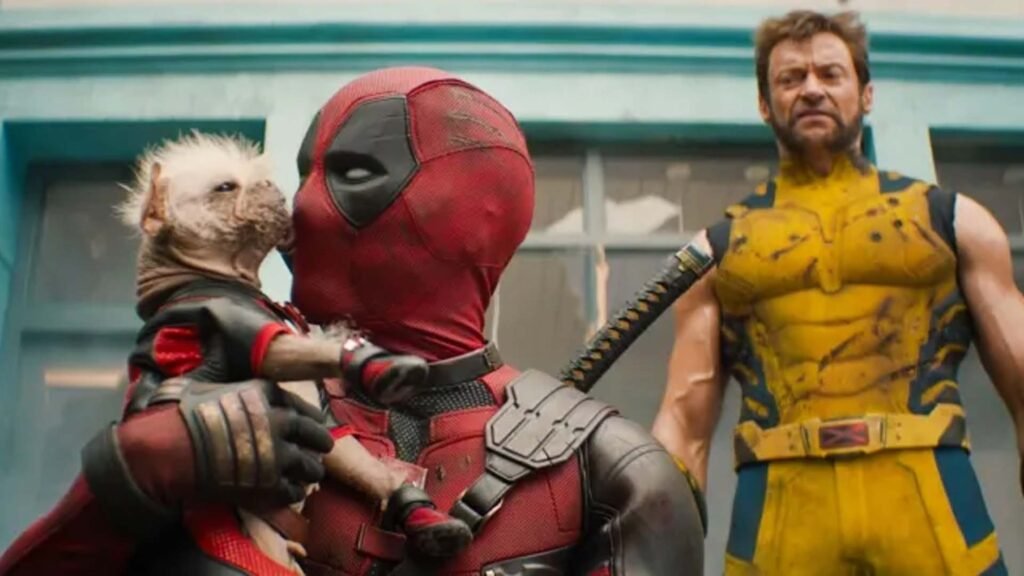 The image features two iconic Marvel Comics characters. In the foreground, we see Deadpool, recognizable by his red and black suit and mask, holding an opossum. Behind him stands Wolverine, wearing his yellow and blue suit with claw marks across the chest. This dynamic duo is sure to captivate fans!