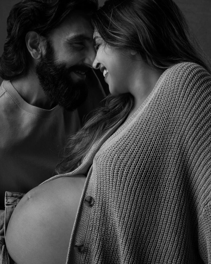 Deepika Padukone and Ranveer Singh smiling and holding their newborn baby girl. Deepika Padukone’s Baby Born, the couple is seen celebrating this joyous moment together