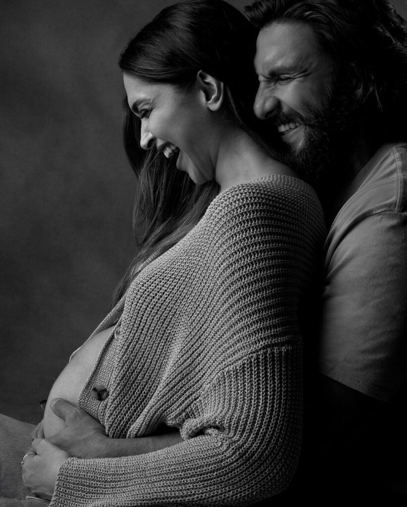 Deepika Padukone and Ranveer Singh smiling and holding their newborn baby girl. Deepika Padukone’s Baby Born, the couple is seen celebrating this joyous moment together