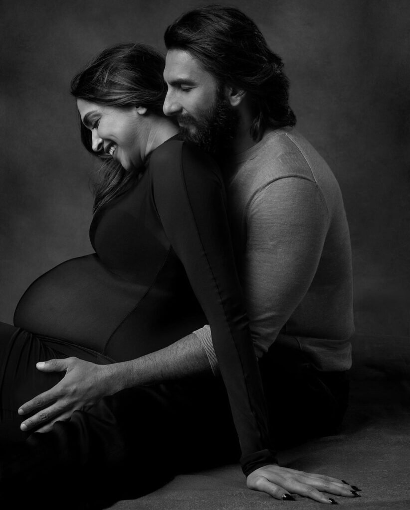 Deepika Padukone and Ranveer Singh smiling and holding their newborn baby girl. Deepika Padukone’s Baby Born, the couple is seen celebrating this joyous moment together