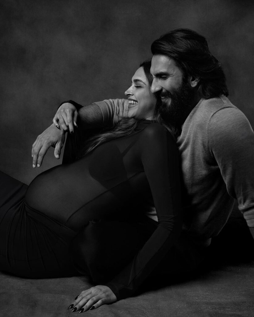 Deepika Padukone and Ranveer Singh smiling and holding their newborn baby girl. Deepika Padukone’s Baby Born, the couple is seen celebrating this joyous moment together