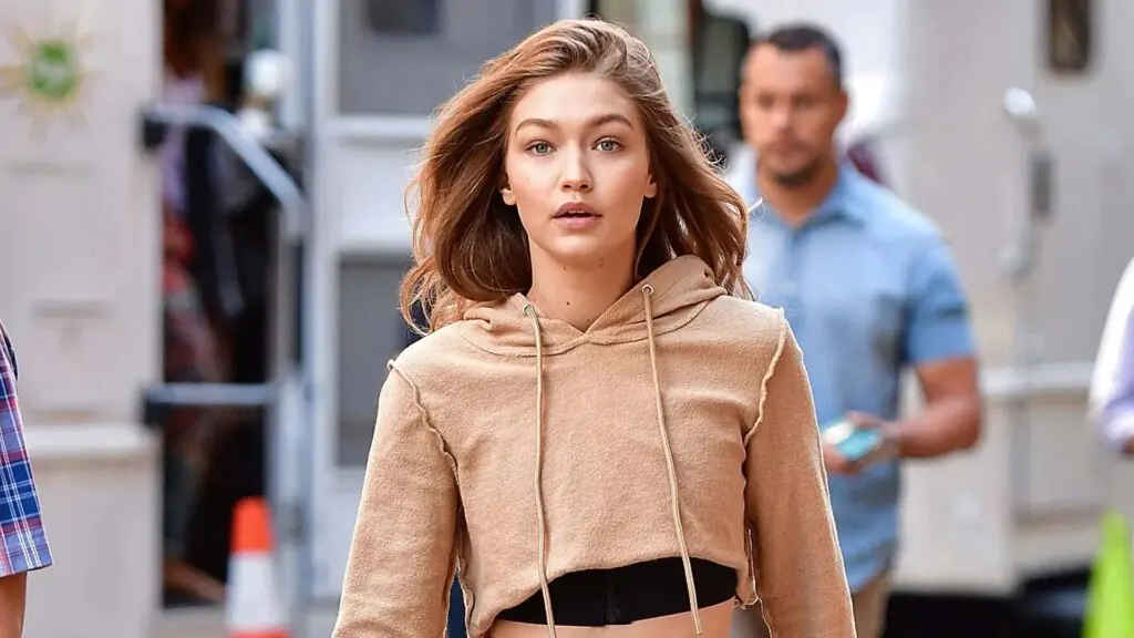 Gigi Hadid in DHL Dress: How This Tape Look Became 2024's Biggest Fashion Buzz 4 Gigi Hadid Transformation from hectic life to relief