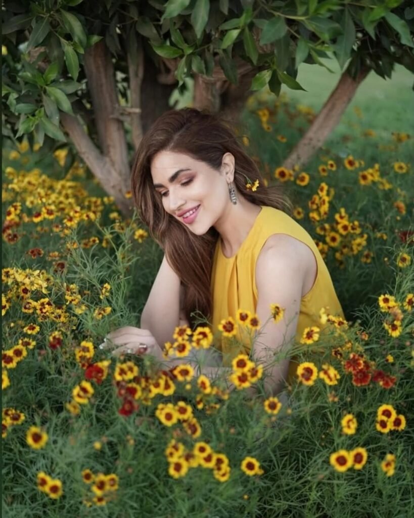 Humaira Asghar with yellow flowers