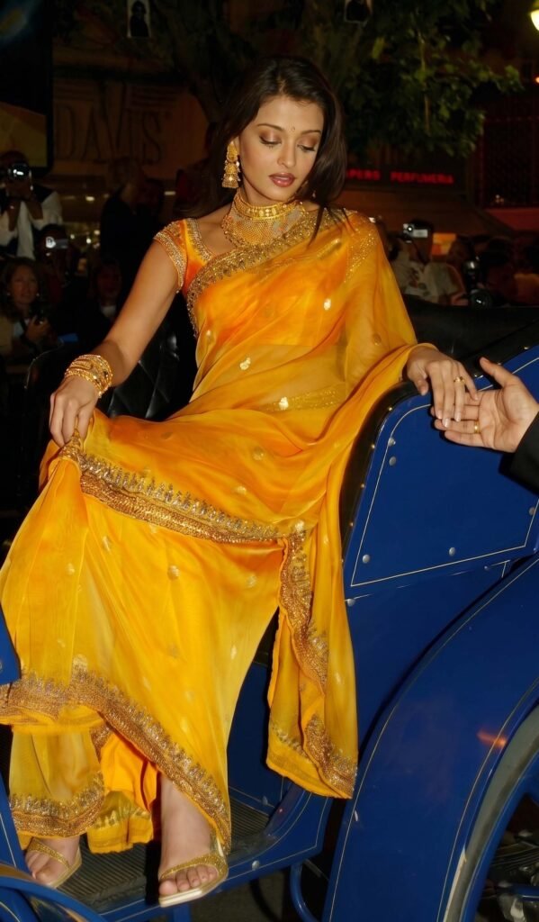 Alia Bhatt Cannes 2026 Owns Every Frame 8 Aishwarya Rai Bachan in yellow sari designed by Neeta Lulla cannes 2002, Aishwarya Rai Cannes 2002