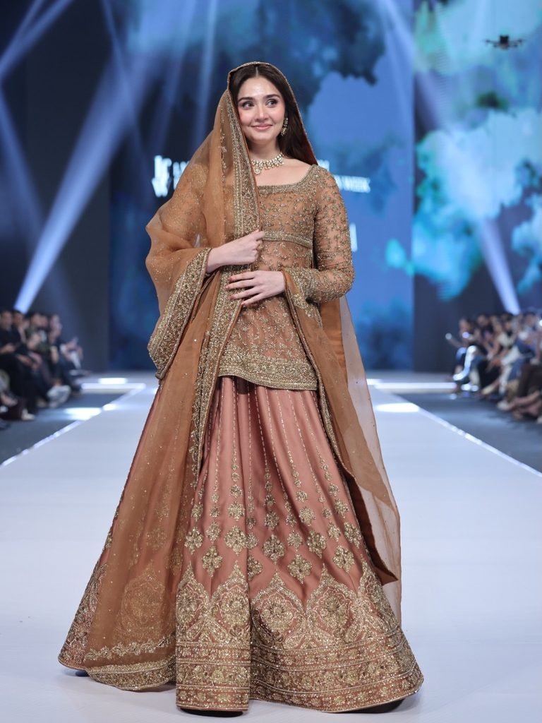 LAAM Fashion Week Season 2 Proved Celebs Aren't the Story 3 Durefishan Saleem walks for MIHHA in a gold bridal lehenga at LAAM Fashion Week Season 2.